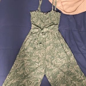 Green and white floral, runs small. Never worn